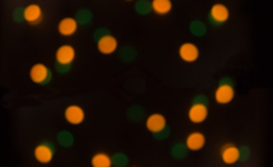 yellow and green holiday bokeh. Abstract christmas background.