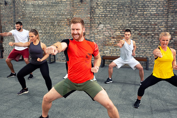 Martial art coach training his group of people