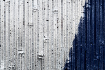 Fototapeta premium Background: Silver and blue stone background divided diagonally