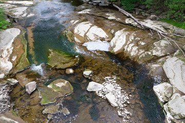 colorful riverbed with aqua and blue colors