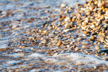 sea pebbles colored granite on the beach