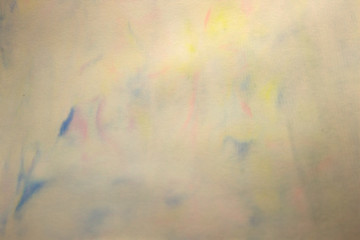 This is a photograph of a Blue,Pink and Yellow abstract background created using watercolours