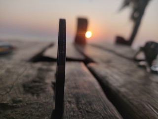 silhouette of man standing in front of sunset
