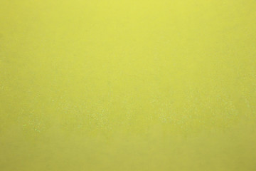 This is a photograph of a Yellow Glittery Background