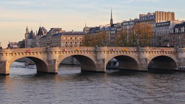 Sena river, bridge, boats, trees, walk path and buildings in Paris
