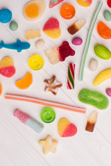 Close up background from colorful sweets of sugar candies. Colorful childs sweets and treats.