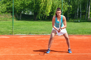 Young tennis player practicing serve return in tennis