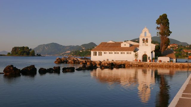 Church of St. Vlacherna. Early morning. The coast of Corfu, Cape Kanoni, Greece. Mediterranean