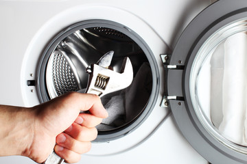 washing machine spanner repair hand