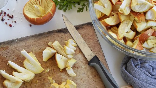 Cooking Amanita caesarea (known as Caesar's mushroom). Highly regarded edible mushroom 