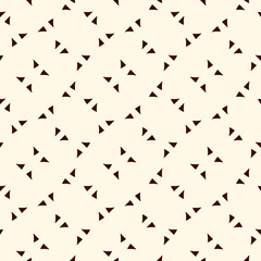Repeated mini triangles minimalist background. Simple abstract wallpaper. Seamless pattern with geometric figures.
