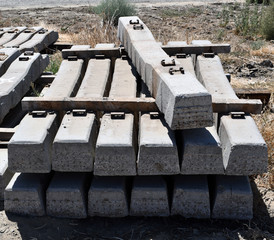 The old removed concrete railway ties on the side railway