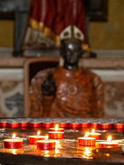 Obraz na płótnie Canvas Votive candles in a catholic church