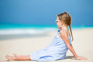 Cute little girl at beach during summer vacation