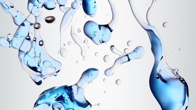 transparent blue oil bubbles and fluid shapes in purified water on a white gradient background. Side angle with crystal colored bubbles in purified cosmetic backdrop with copy space for science