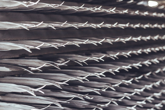 Devils fork fence panels stacked in a hardware warehouse