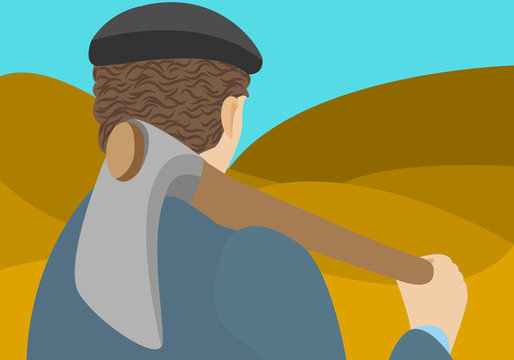 Agricultor con una azada en un campo de cultivo.