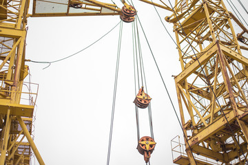 The place is a tower cranes and machinery.