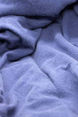 This is a photograph of a Light Blue textured fabric background