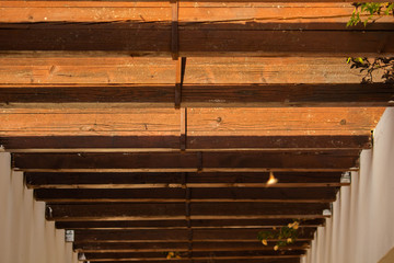wooden partition in the ceiling, brown color