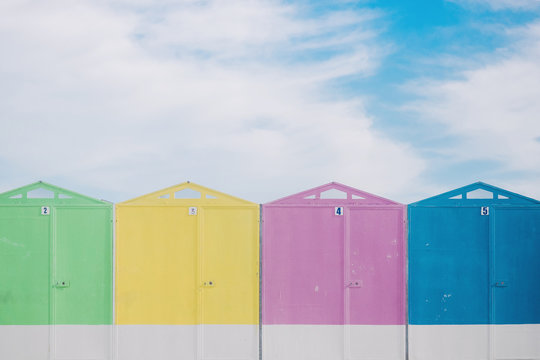Row of colorful beach huts