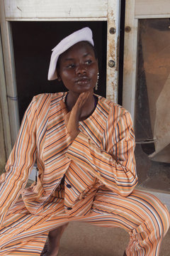 Woman with white cap looking aside