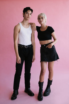 Studio portrait of young man and woman