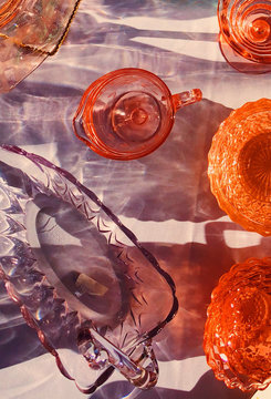 Overhead view of colorful vintage glass tableware
