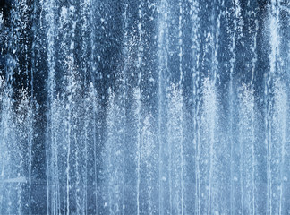 Vertical water fountain jet background