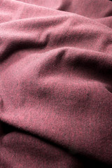 Fototapeta premium This is a photograph of textured Maroon Red fabric