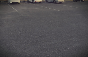 Obraz na płótnie Canvas Cars parked in the parking lot.