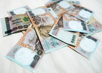 Obraz na płótnie Canvas Background with money thai thousand baht bills