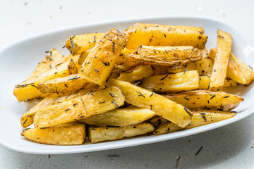 Spicy Potato Wedges in Plate for Snacks at Party
