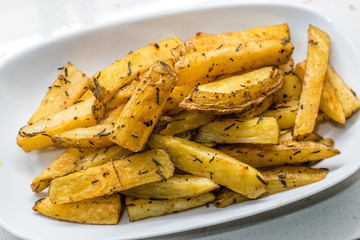 Spicy Potato Wedges in Plate for Snacks at Party