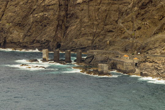 Santa Catalina beach. Huge concrete piers for davit and the ruins of the old Hermigua port used for export of bananas and other agricultural products. La Gomera, Canary Islands, Spain