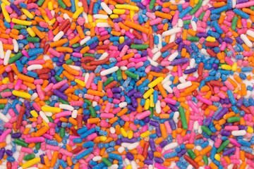 This is a photograph of colorful sprinkles isolated on a White background