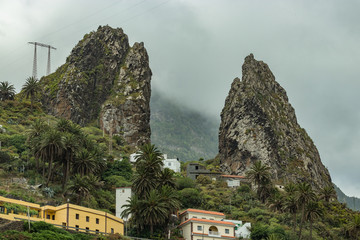 San Pedro Rocks - volcanic twin mountains, natural landmark of La Hermigua in the northeastern La Gomera Canary Islands Spain
