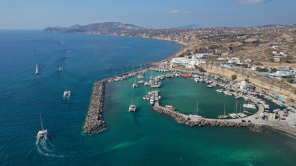 Fototapeta na wymiar Aerial drone photo of famous round port of Vlychada, Santorini island, Cyclades, Greece
