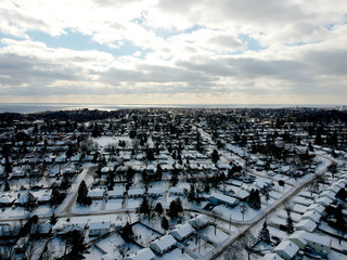 Aerial view of the city. Hundreds of houses bird eye top view suburb urban housing development....