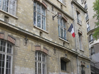 Fototapeta na wymiar French Flag on Building
