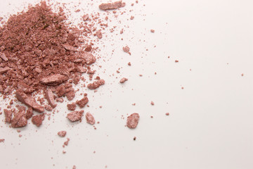 This is a photograph of a Pearly Pink powder eyeshadow isolated on a White background