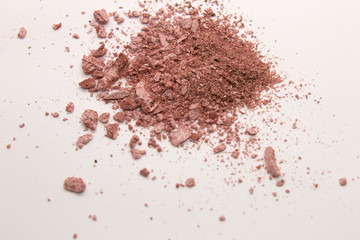 Obraz na płótnie Canvas This is a photograph of a Pearly Pink powder eyeshadow isolated on a White background