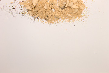 This is a photograph of a Bisque powder Eyeshadow isolated on a White background