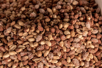 Unpeeled salted peanuts, in bulk in a street market