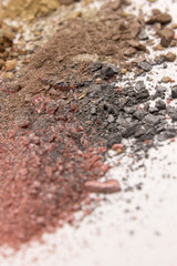 This is a photograph of a colorful powder eyeshadow background