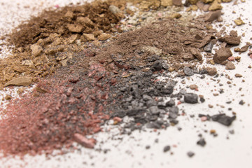 This is a photograph of a colorful powder eyeshadow background