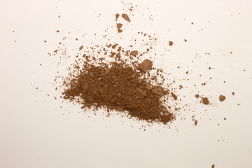 Fototapeta na wymiar This is a photograph of a Bronzer powder makeup isolated on a White background