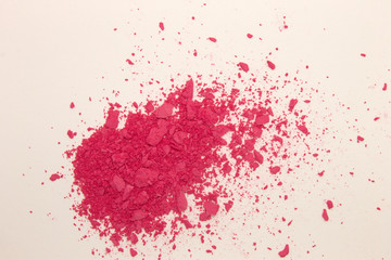 This is a photograph of Fuschia Pink powder Blusher isolated on a White background