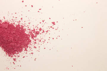 This is a photograph of Pink powder Blusher isolated on a White background