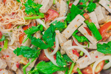 Instant noodle salad with seafood and vegetable. It is spicy and very hot but yummy. This is clever menu. Easy cook and fast. Instant noodle can do for easy dinner and good meal.